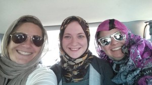Joey Larson, Autumn Bedore, and Angela Howard are all smiles on their way to visit an Islamic mosque during their mission trip to the Twin Cities.